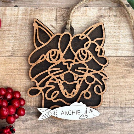 Crazy Cat line art cat ornament laser cut from natural wood, minimalist feline silhouette design