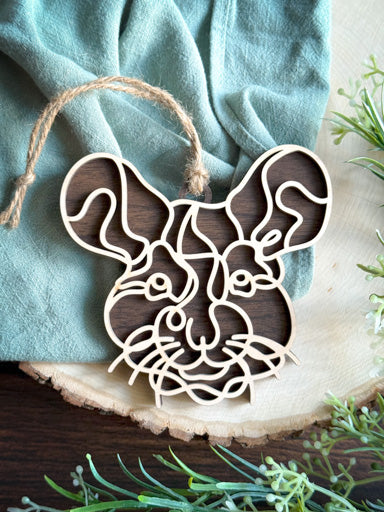 mouse line art ornament laser cut from natural wood in continuous line style