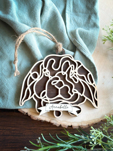 lop rabbit line art ornament laser cut from natural wood in continuous line style