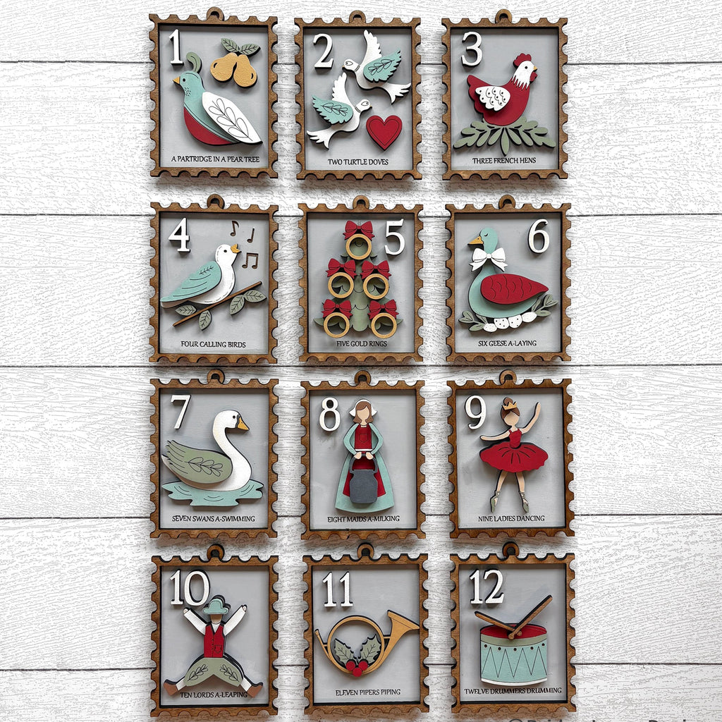 12 Days of Christmas Christmas Ornaments shaped like postage stamps.
