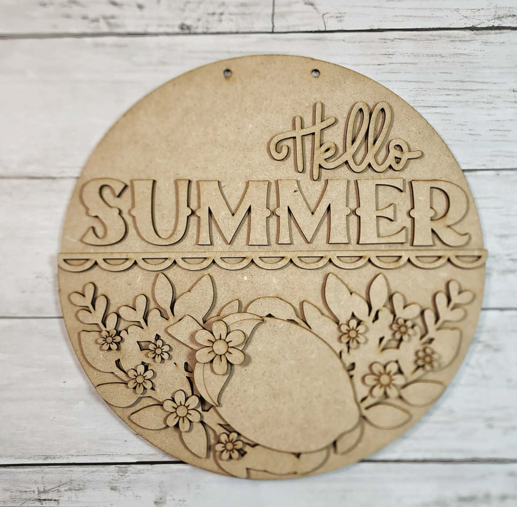 Round wooden sign with 'Hello Summer' text on a wooden background