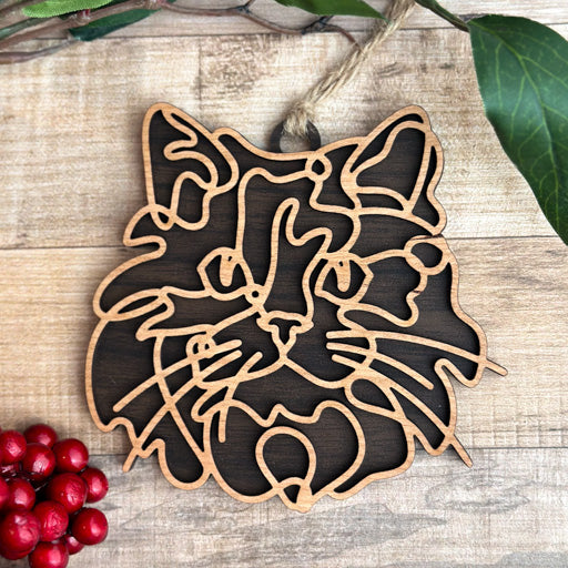 Birman line art cat ornament laser cut from natural wood, minimalist feline silhouette design