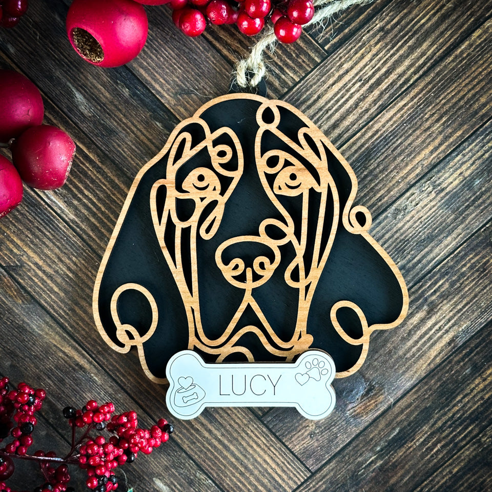 Bloodhound line art dog ornament laser cut from natural wood.