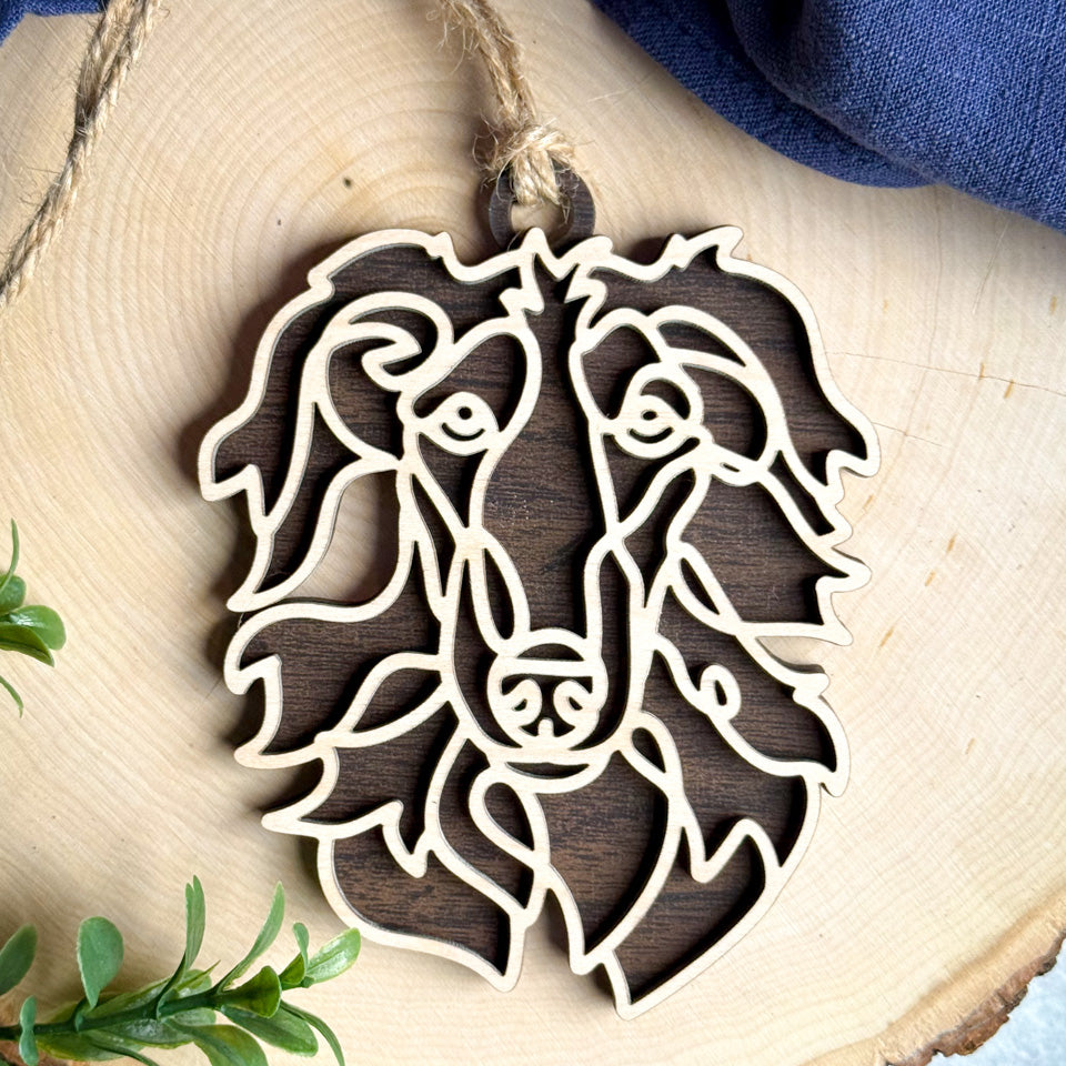 Borzoi line art dog ornament laser cut from natural wood.