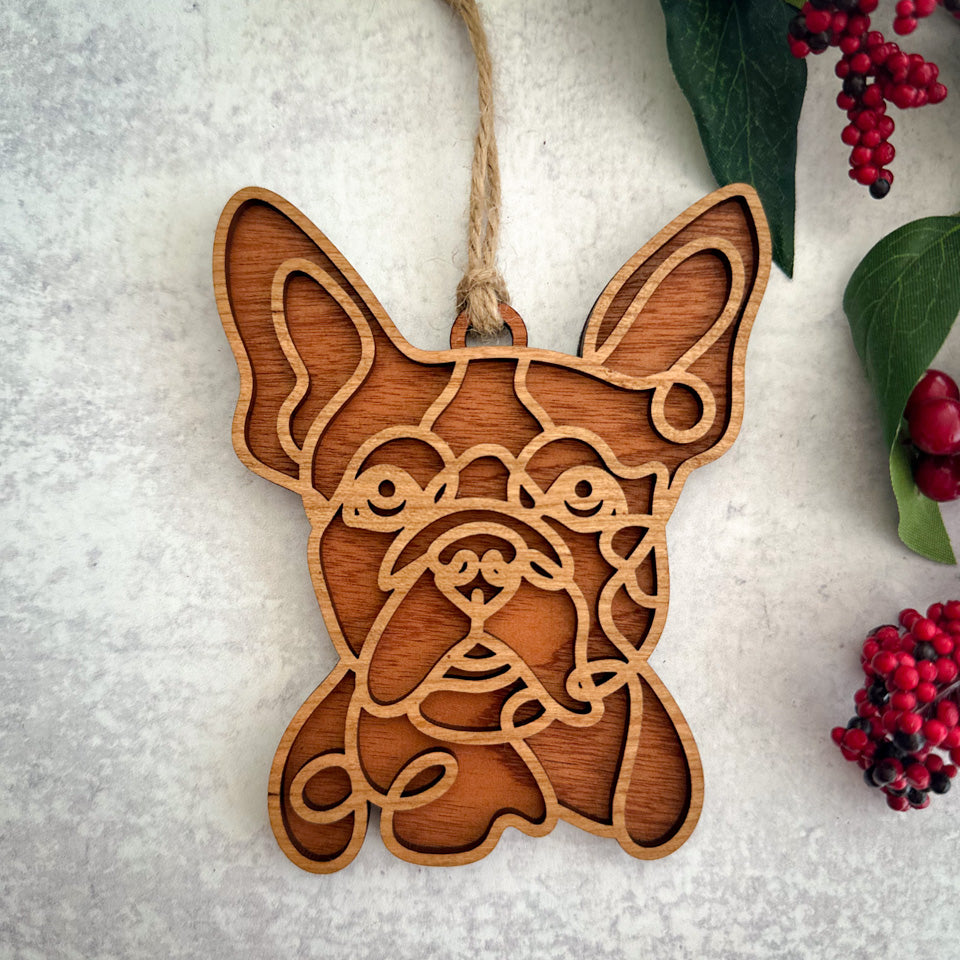 Boston Terrier line art dog ornament laser cut from natural wood.
