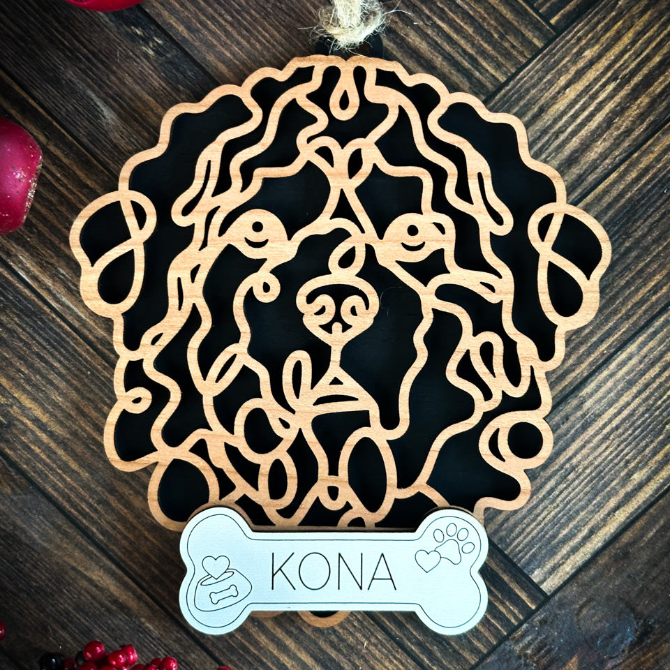Bouvier Des Flanders line art dog ornament laser cut from natural wood.