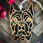 Boxer with cropped ears line art dog ornament laser cut from natural wood.