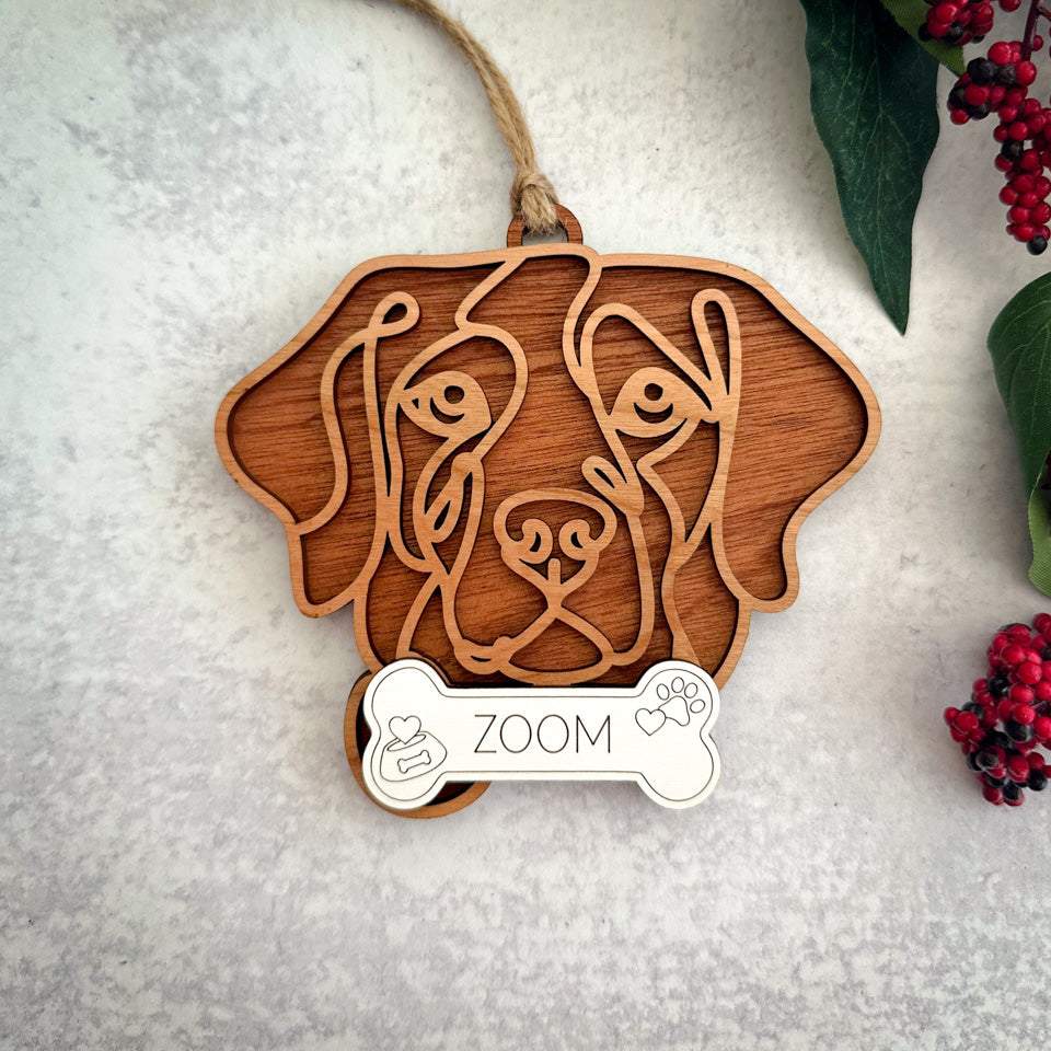 Brittany Spaniel line art dog ornament laser cut from natural wood.