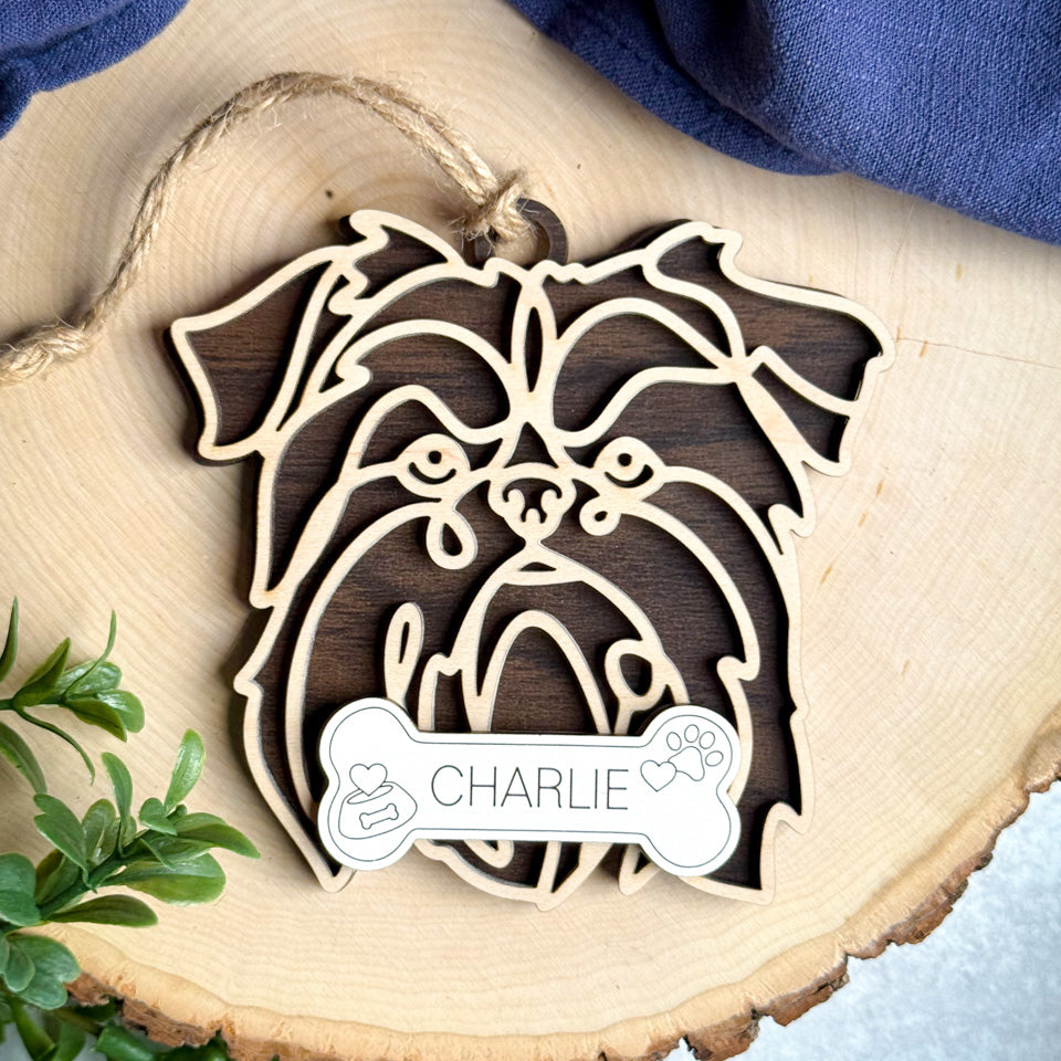 Brussels Griffon line art dog ornament laser cut from natural wood.