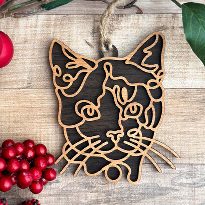 Calico - Short Hair line art cat ornament laser cut from natural wood, minimalist feline silhouette design