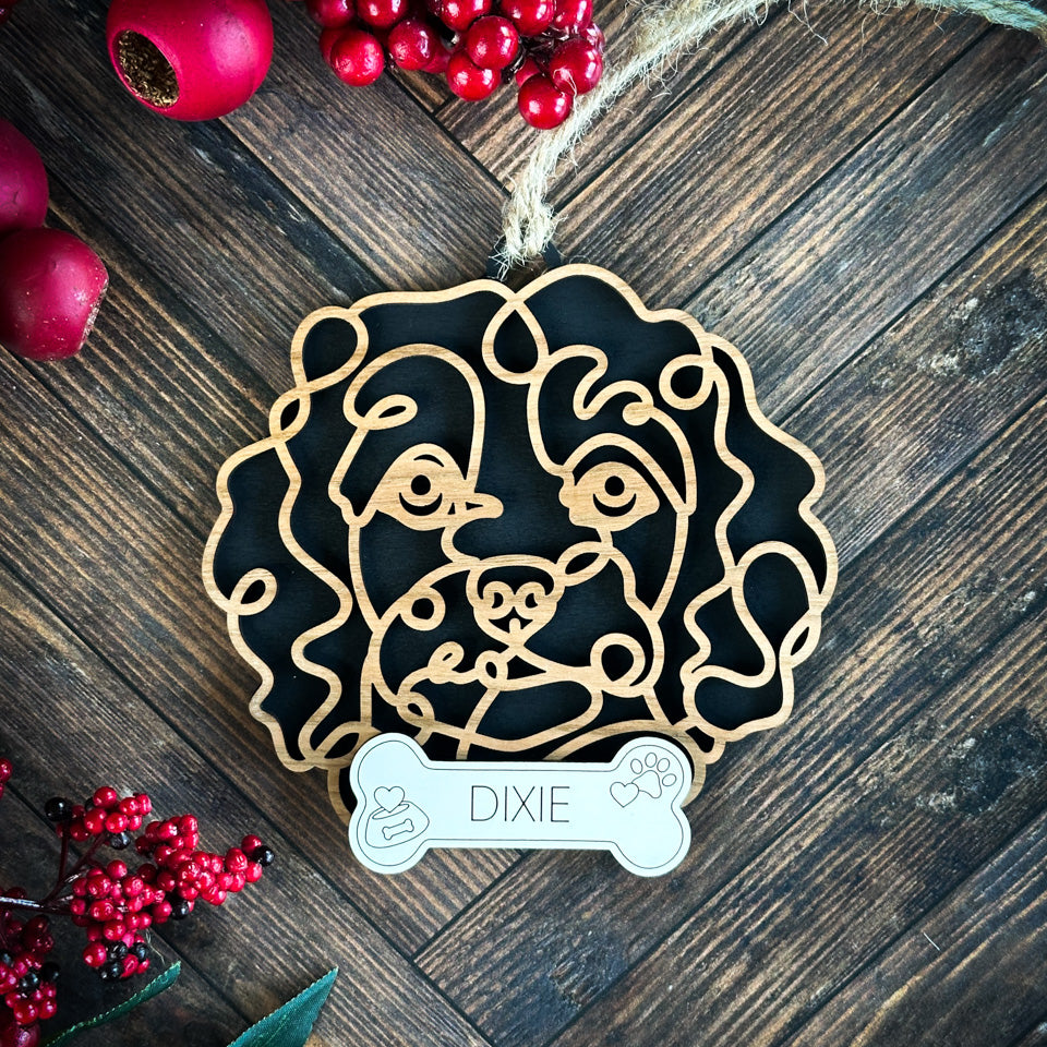 Cavachon line art dog ornament laser cut from natural wood.