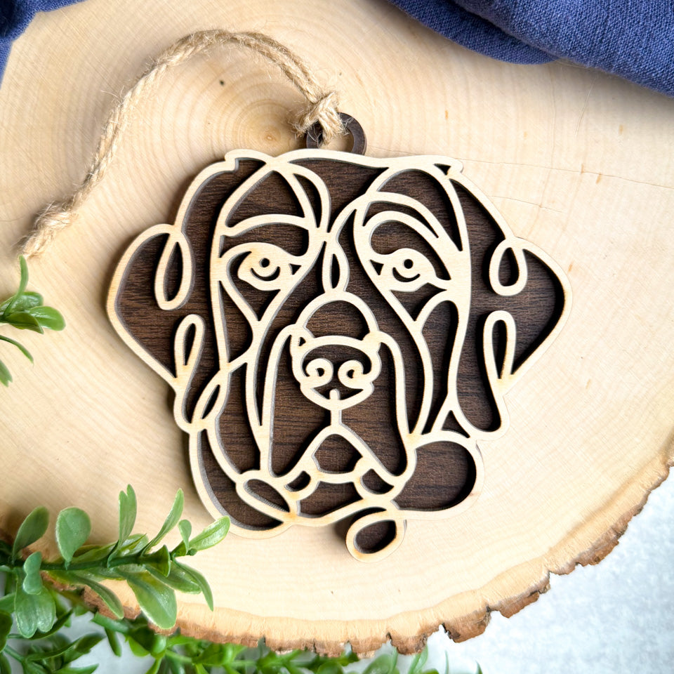 Chesapeake Bay Retriever line art dog ornament laser cut from natural wood.