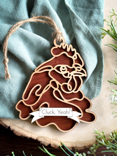 chicken line art ornament laser cut from natural wood in continuous line style