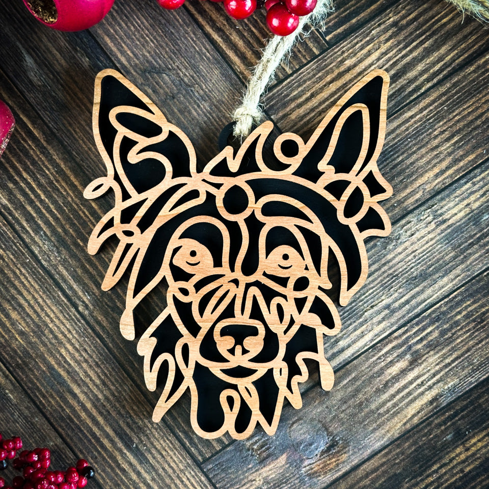 Chinese Crested line art dog ornament laser cut from natural wood.