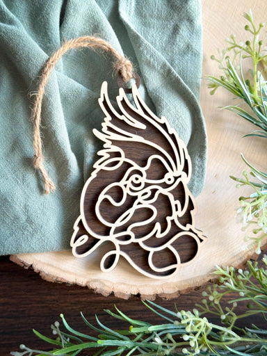 cockatiel line art ornament laser cut from natural wood in continuous line style