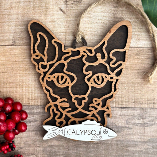 Cornish Rex line art cat ornament laser cut from natural wood, minimalist feline silhouette design