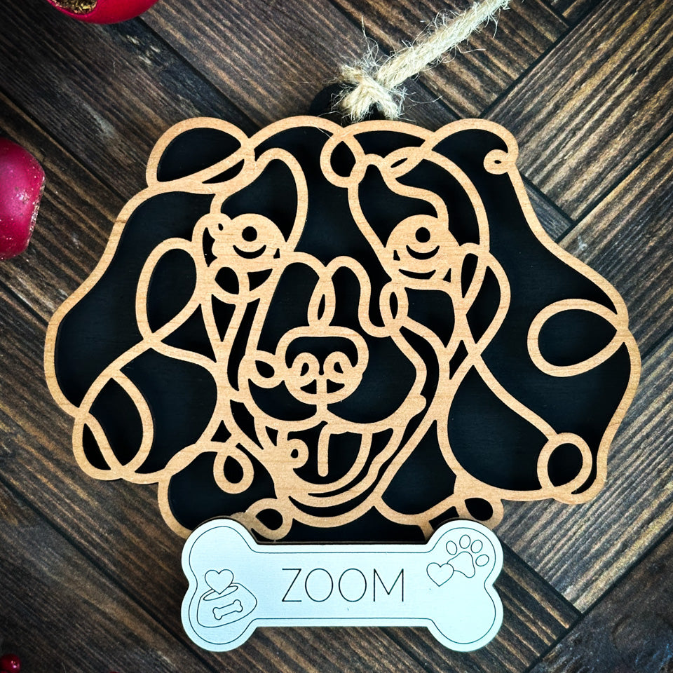 Dachshund line art dog ornament laser cut from natural wood.