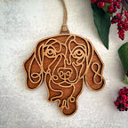 Dachshund line art dog ornament laser cut from natural wood.