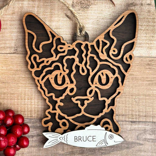 Devon Rex line art cat ornament laser cut from natural wood, minimalist feline silhouette design