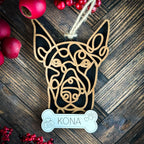 Dobermann line art dog ornament laser cut from natural wood.