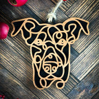 Dobermann line art dog ornament laser cut from natural wood.