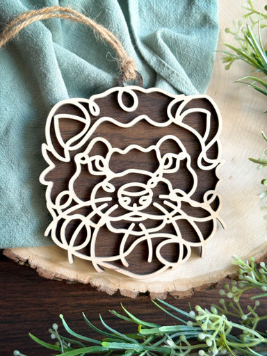 ferret line art ornament laser cut from natural wood in continuous line style