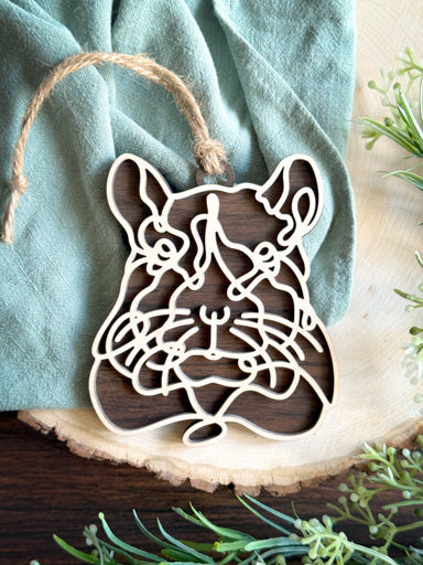 gerbil line art ornament laser cut from natural wood in continuous line style