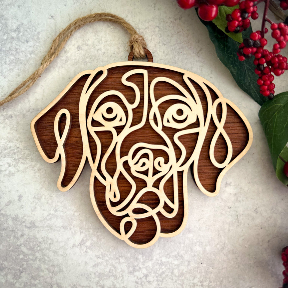 German Shorthair Pointer line art dog ornament laser cut from natural wood.