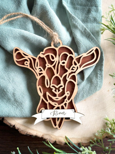 goat line art ornament without horns laser cut from natural wood in continuous line style