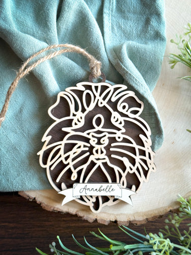  longhair guinea pig line art ornament laser cut from natural wood in continuous line style