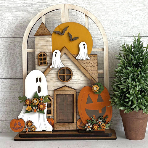 Halloween-themed decorative insert for Arched Doorway with ghosts, pumpkins, and a haunted house design.
