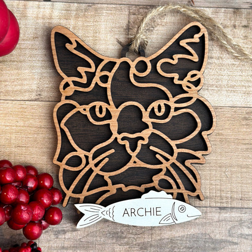 Havana Brown line art cat ornament laser cut from natural wood, minimalist feline silhouette design