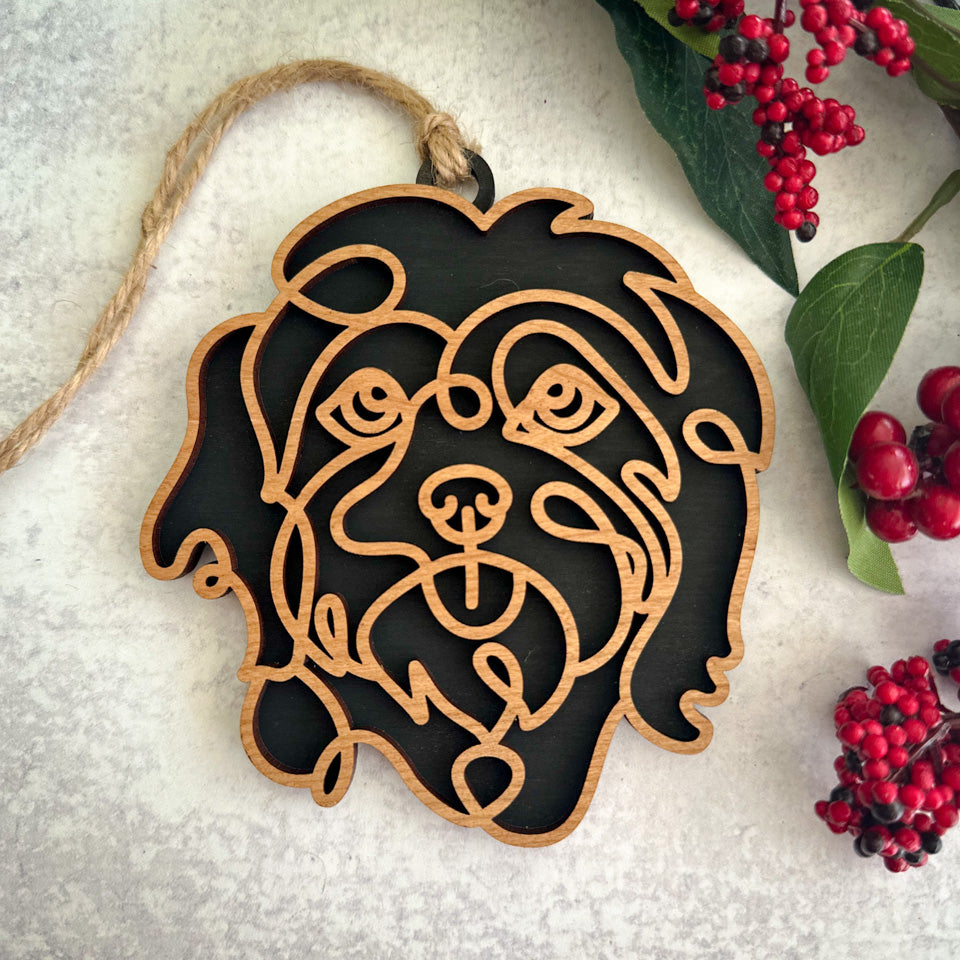 Havanese line art dog ornament laser cut from natural wood.
