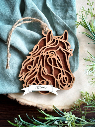 horse line art ornament laser cut from natural wood in continuous line style