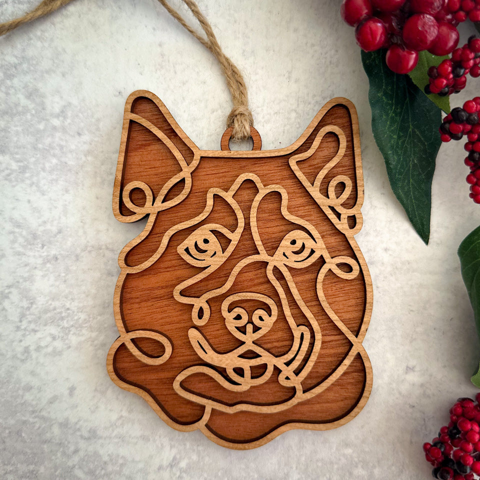 Husky line art dog ornament laser cut from natural wood.