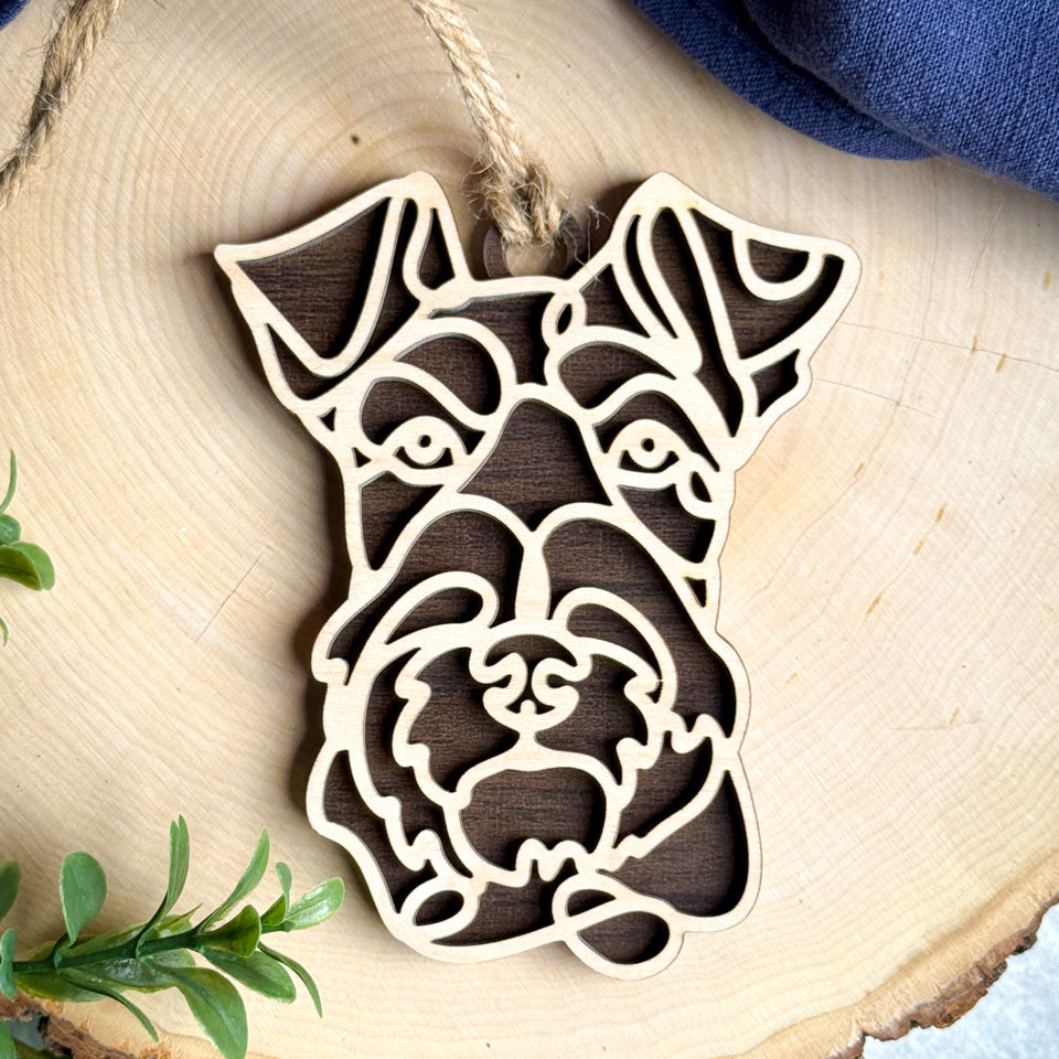 Irish Terrier line art dog ornament laser cut from natural wood.