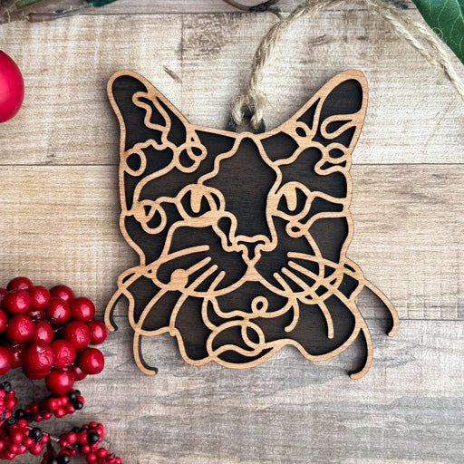 LaPerm line art cat ornament laser cut from natural wood, minimalist feline silhouette design