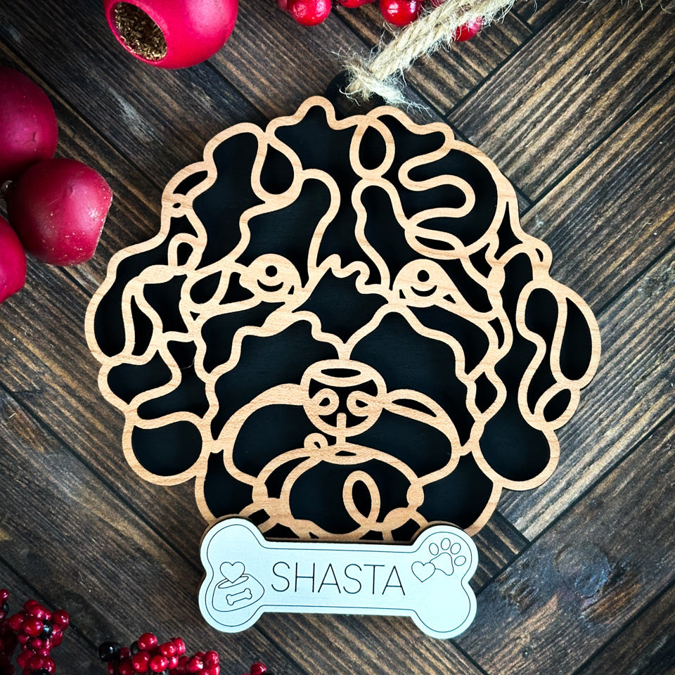 Labradoodle line art dog ornament laser cut from natural wood.