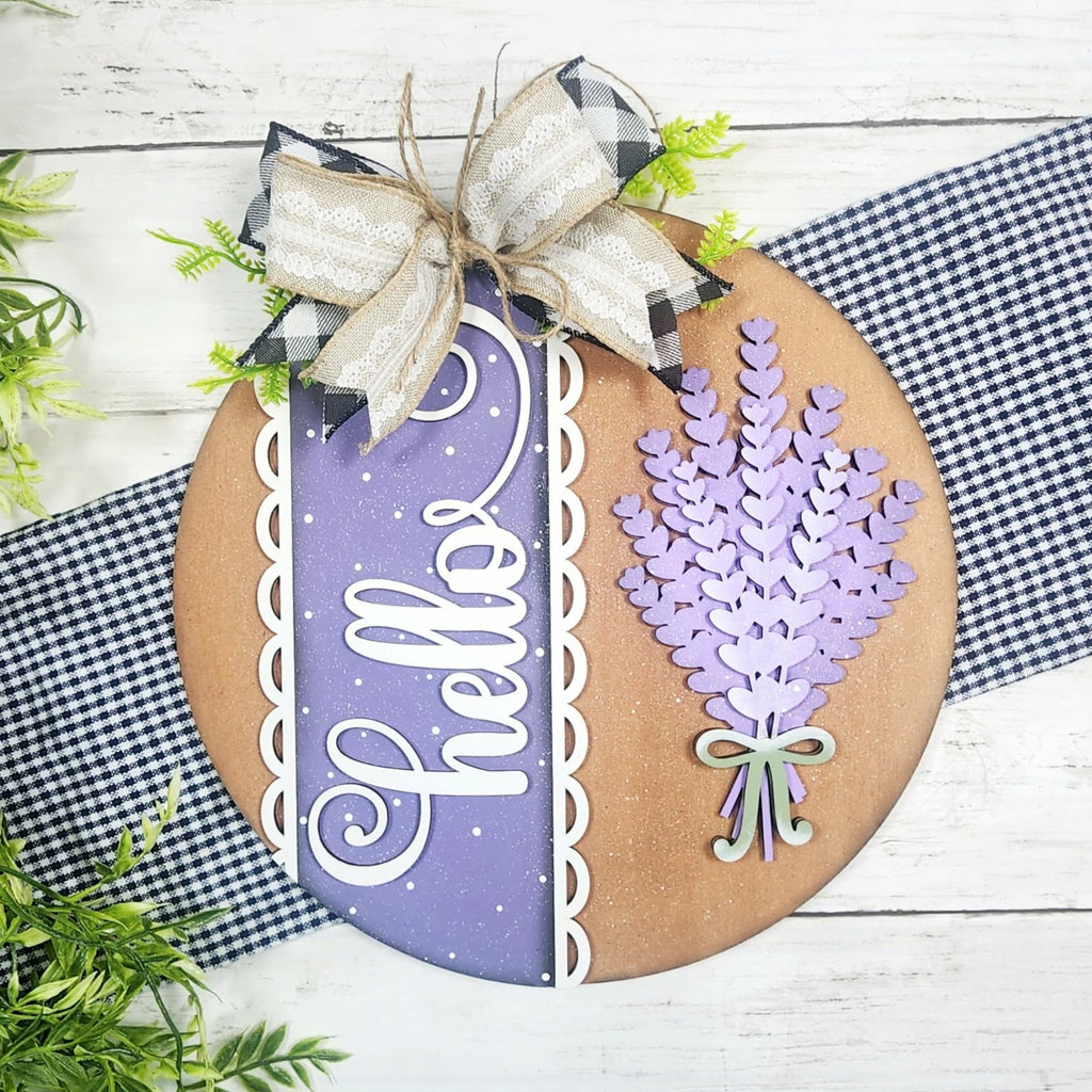Decorative sign with lavender design and 'Hello' text on a wooden background