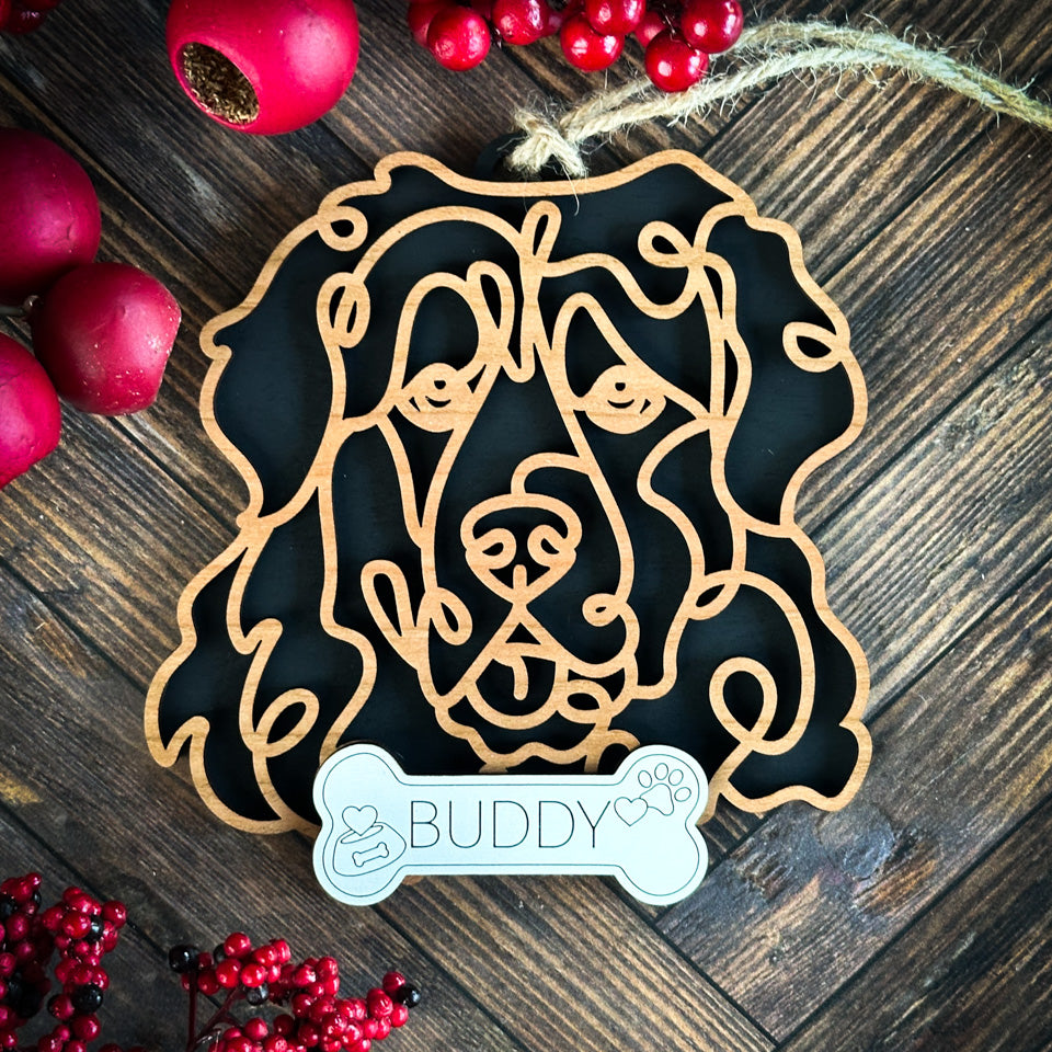 Leonberger line art dog ornament laser cut from natural wood.