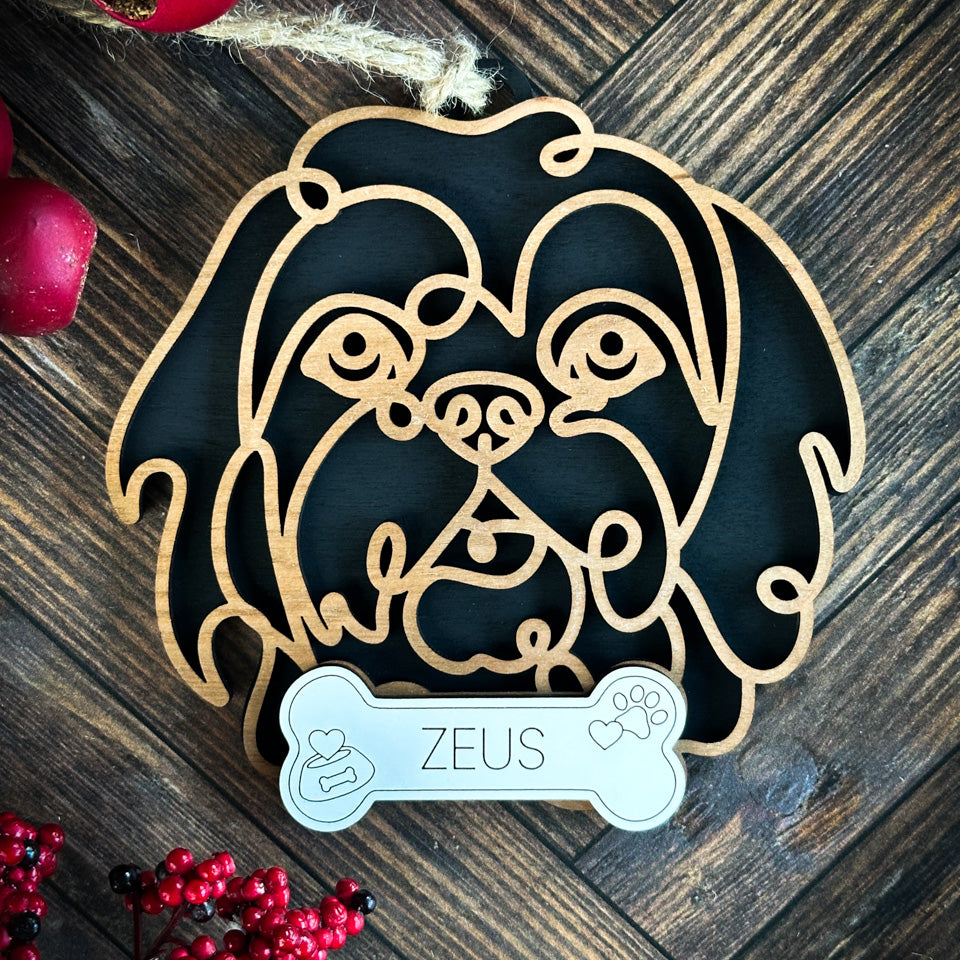Lhasa Apso line art dog ornament laser cut from natural wood.