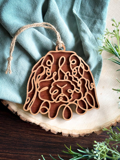 lop rabbit line art ornament laser cut from natural wood in continuous line style
