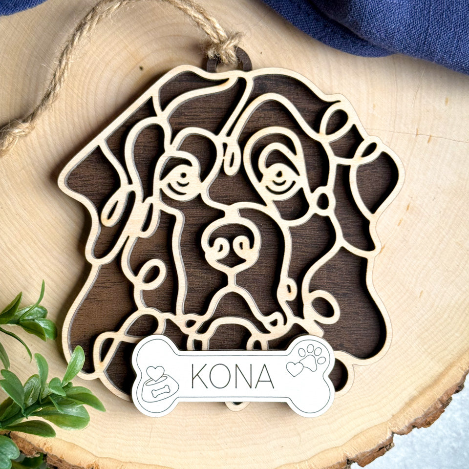Maremma Sheepdog line art dog ornament laser cut from natural wood.