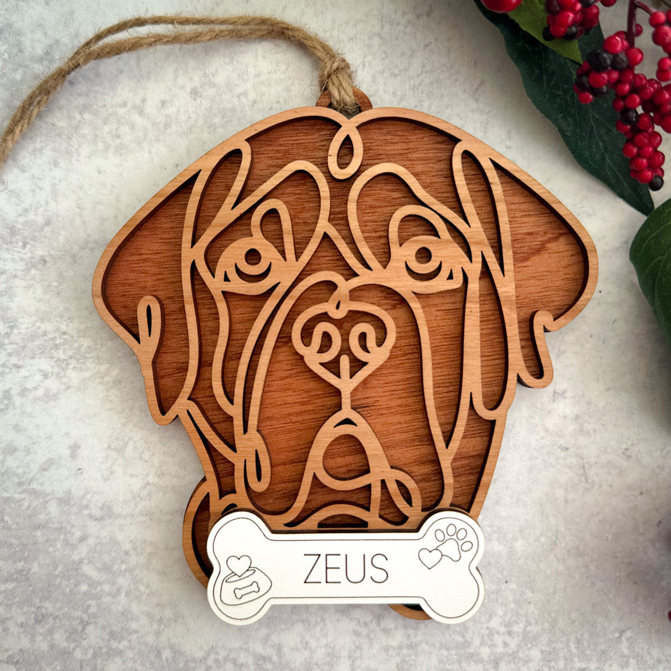 Mastiff line art dog ornament laser cut from natural wood.