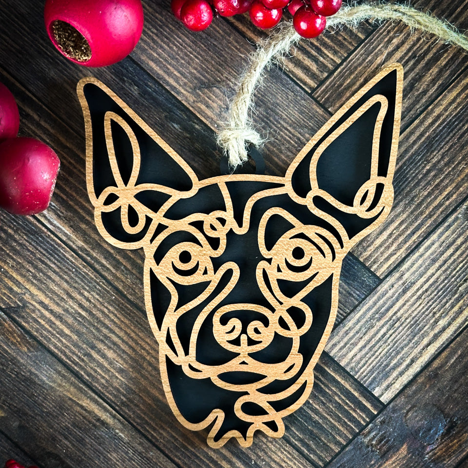 Mini Pinscher Pointy Ears line art dog ornament laser cut from natural wood.