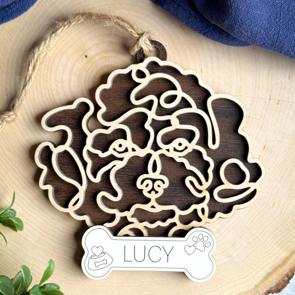 Miniature Poodle line art dog ornament laser cut from natural wood.