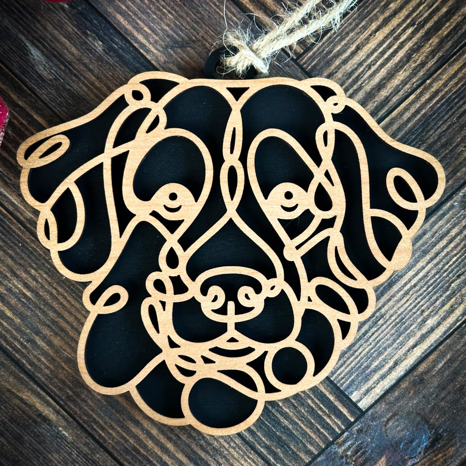 Nova Scotia Duck Toller line art dog ornament laser cut from natural wood.