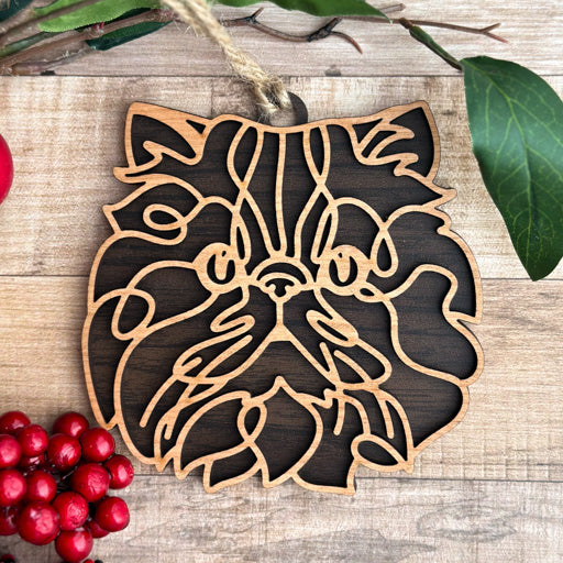 Persian line art cat ornament laser cut from natural wood, minimalist feline silhouette design
