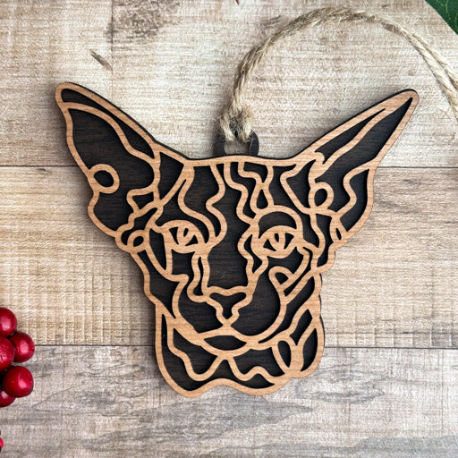 Peterbald line art cat ornament laser cut from natural wood, minimalist feline silhouette design