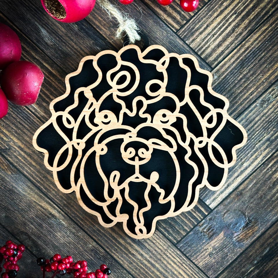 Portuguese Water Dog line art dog ornament laser cut from natural wood.